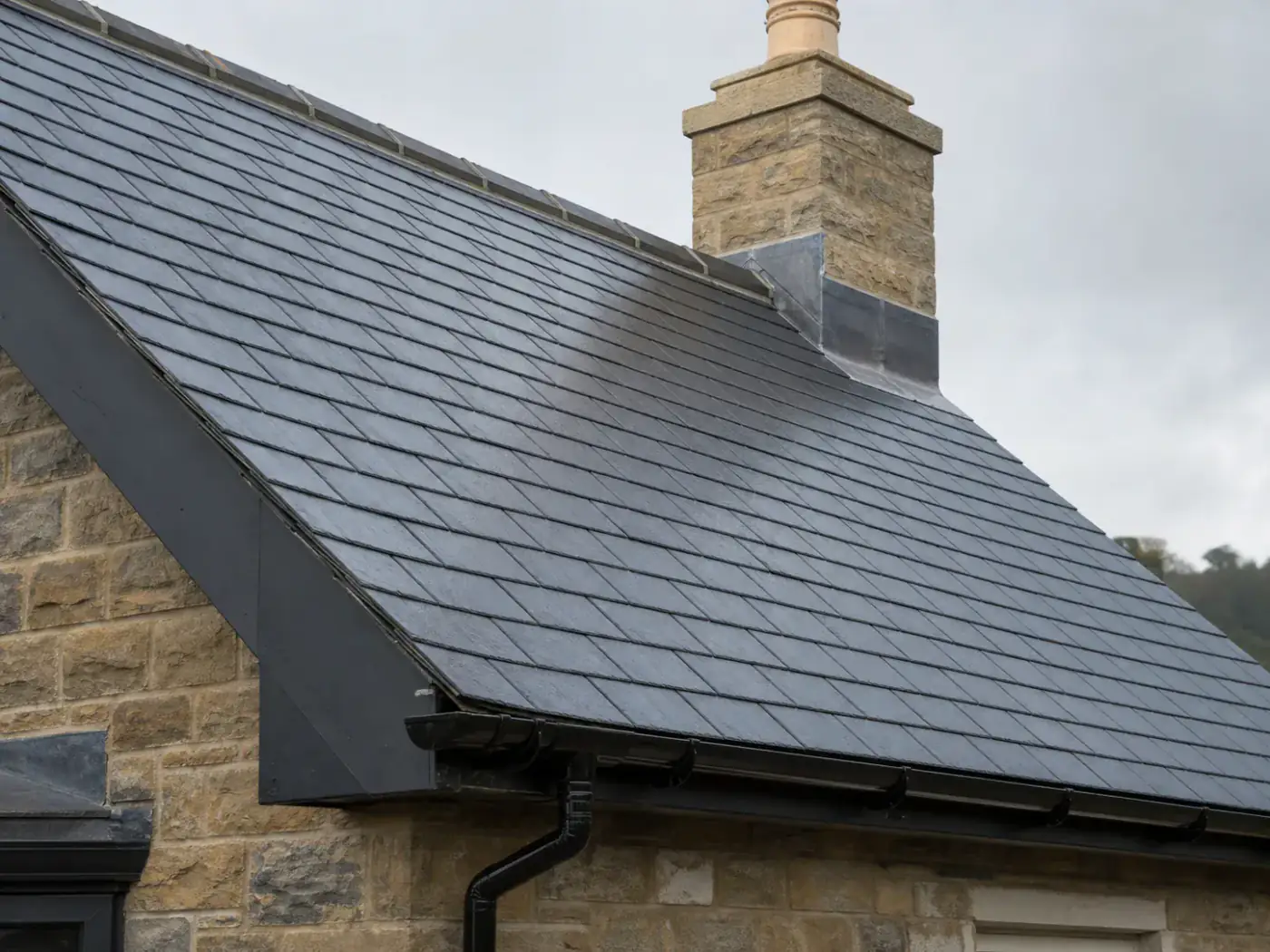 Concept image showing new natural slate roof and leadwork