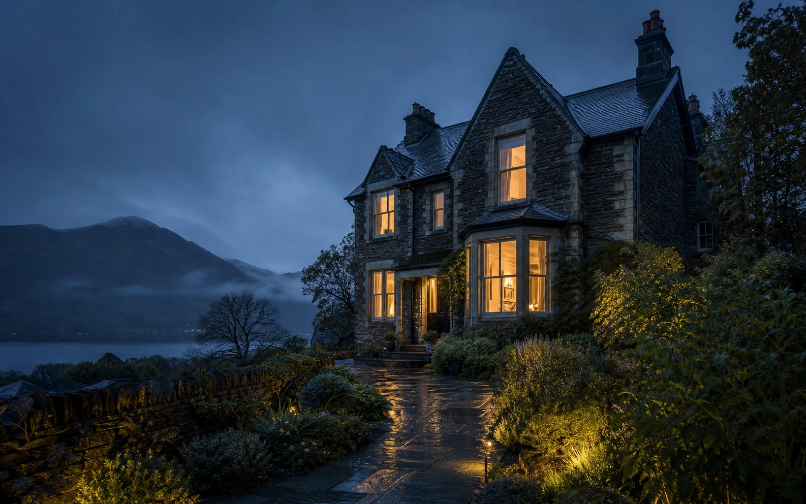 Fictional Lakeland guesthouse glowing above the lake at blue hour